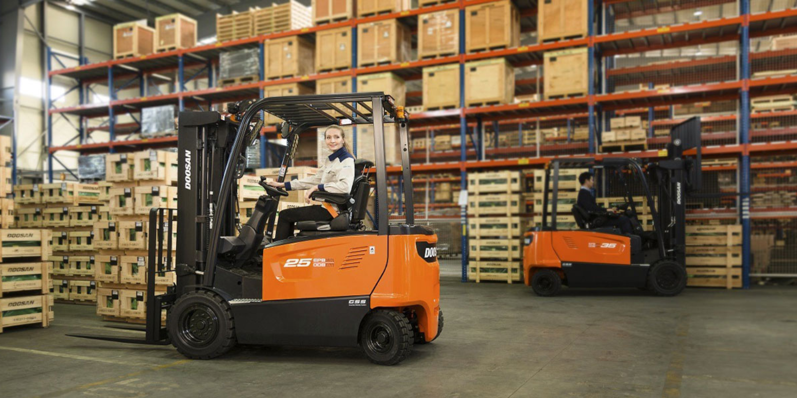 Woman operating Doosan forklift