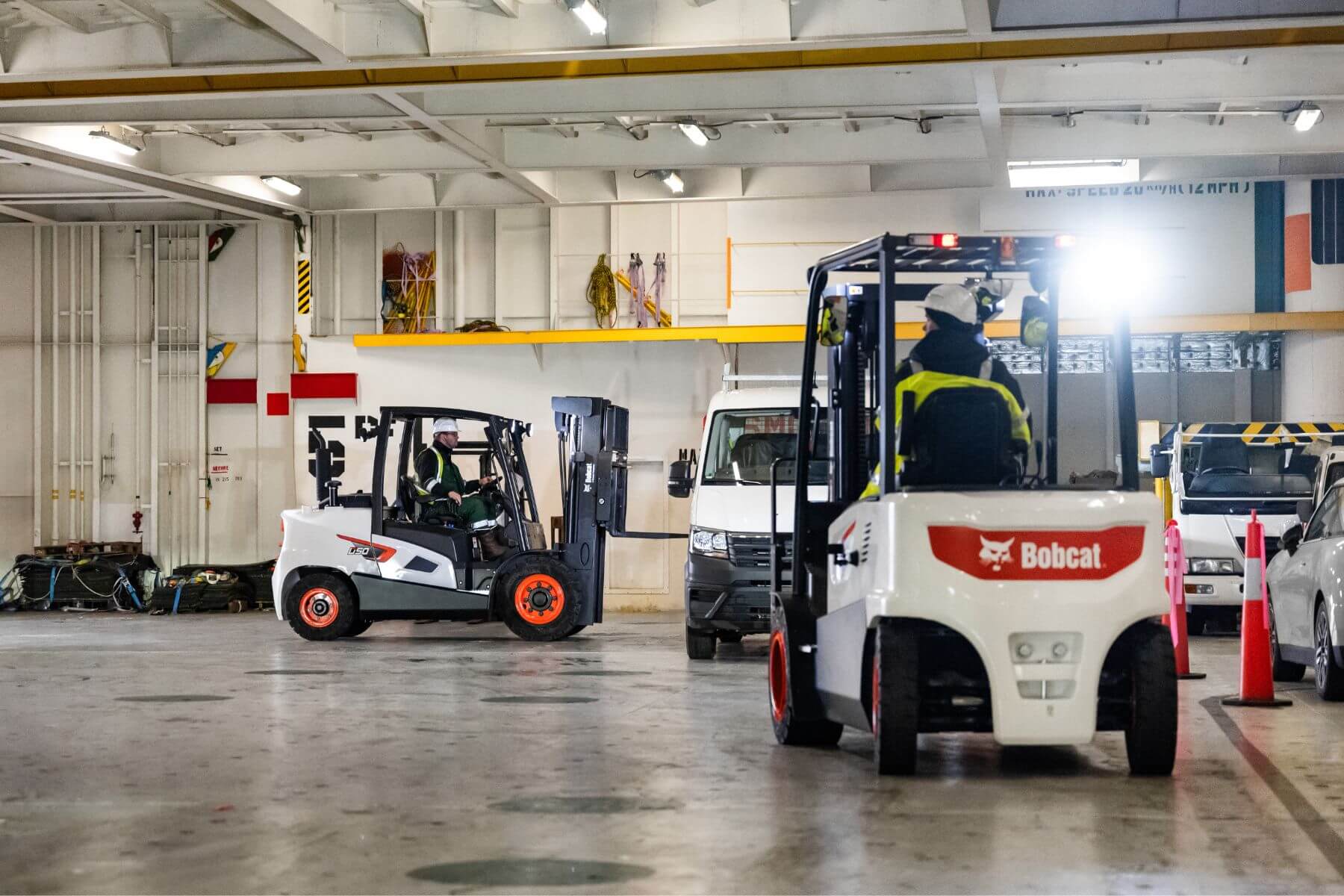Two Bobcat Diesel Forklifts in warehouse area